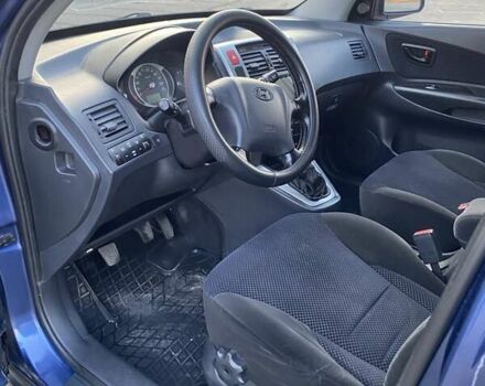 Хендай Туксон 2010 в Харькове на Automoto.ua Синий Хендай Туксон, объемом двигателя 1.98 л и пробегом 192 тыс. км за 9400 $, фото 10 на Automoto.ua