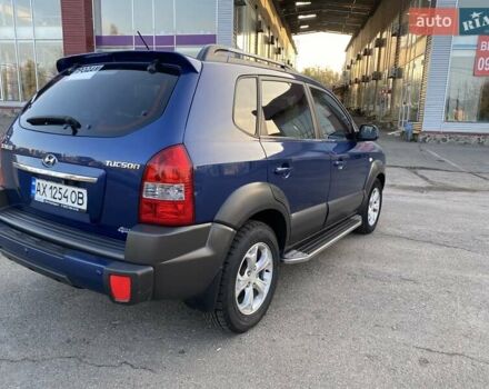 Хендай Туксон 2010 в Харькове на Automoto.ua Синий Хендай Туксон, объемом двигателя 1.98 л и пробегом 192 тыс. км за 9400 $, фото 4 на Automoto.ua