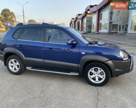 Хендай Туксон 2010 в Харькове на Automoto.ua Синий Хендай Туксон, объемом двигателя 1.98 л и пробегом 192 тыс. км за 9400 $, фото 5 на Automoto.ua