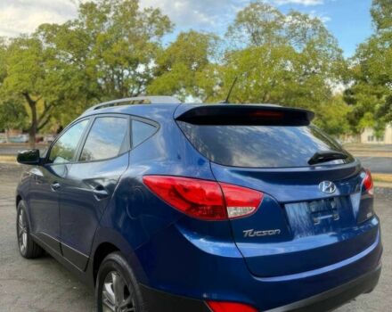 Синий Хендай Туксон, объемом двигателя 2.4 л и пробегом 76 тыс. км за 9600 $, фото 5 на Automoto.ua