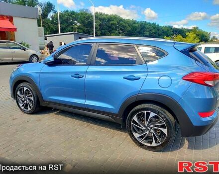 Синій Хендай Туксон, об'ємом двигуна 2 л та пробігом 198 тис. км за 15700 $, фото 1 на Automoto.ua