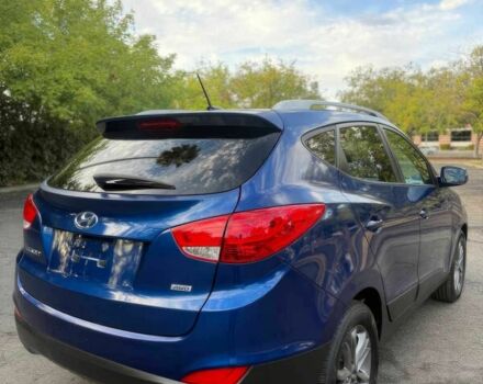 Синий Хендай Туксон, объемом двигателя 2.4 л и пробегом 76 тыс. км за 9600 $, фото 7 на Automoto.ua