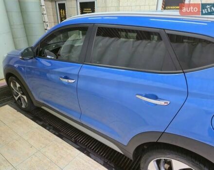 Синий Хендай Туксон, объемом двигателя 1.59 л и пробегом 136 тыс. км за 14300 $, фото 4 на Automoto.ua