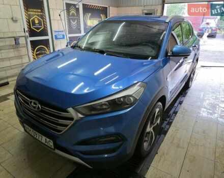 Синий Хендай Туксон, объемом двигателя 1.59 л и пробегом 136 тыс. км за 14300 $, фото 2 на Automoto.ua