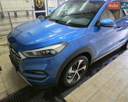 Синий Хендай Туксон, объемом двигателя 1.59 л и пробегом 125 тыс. км за 14800 $, фото 13 на Automoto.ua