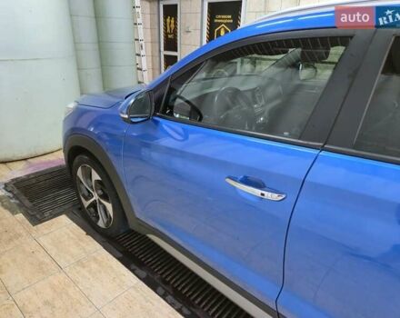 Синий Хендай Туксон, объемом двигателя 1.59 л и пробегом 125 тыс. км за 14800 $, фото 5 на Automoto.ua