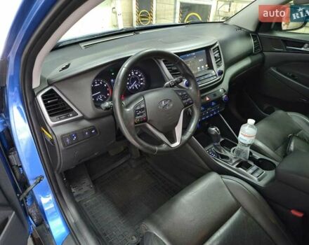 Синий Хендай Туксон, объемом двигателя 1.59 л и пробегом 136 тыс. км за 14300 $, фото 16 на Automoto.ua
