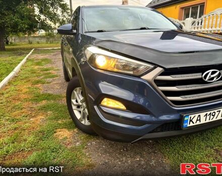 Синий Хендай Туксон, объемом двигателя 2 л и пробегом 86 тыс. км за 18500 $, фото 3 на Automoto.ua