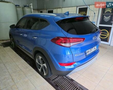 Синий Хендай Туксон, объемом двигателя 1.59 л и пробегом 125 тыс. км за 14800 $, фото 3 на Automoto.ua