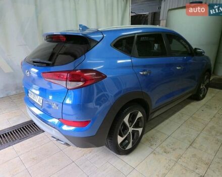 Синий Хендай Туксон, объемом двигателя 1.59 л и пробегом 125 тыс. км за 14800 $, фото 7 на Automoto.ua