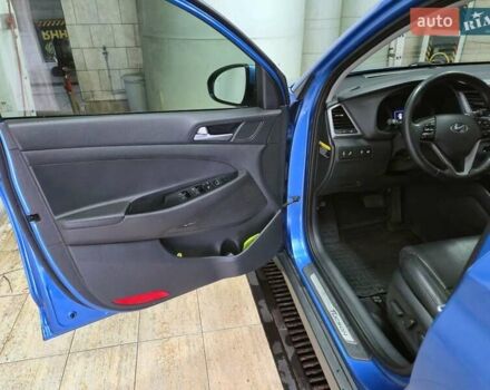 Синий Хендай Туксон, объемом двигателя 1.59 л и пробегом 136 тыс. км за 14300 $, фото 11 на Automoto.ua