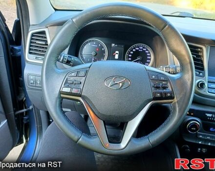 Синій Хендай Туксон, об'ємом двигуна 2 л та пробігом 162 тис. км за 18000 $, фото 5 на Automoto.ua