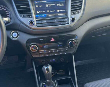 Синій Хендай Туксон, об'ємом двигуна 2 л та пробігом 90 тис. км за 21500 $, фото 2 на Automoto.ua