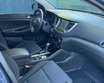 Синій Хендай Туксон, об'ємом двигуна 2 л та пробігом 90 тис. км за 19500 $, фото 3 на Automoto.ua