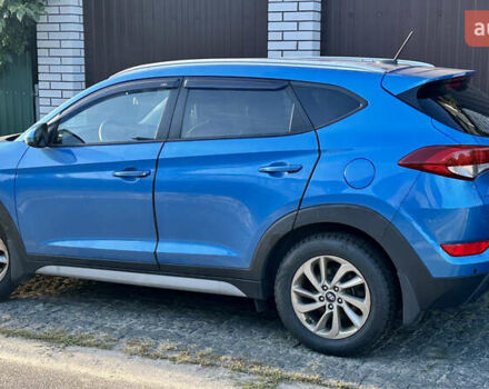 Синій Хендай Туксон, об'ємом двигуна 2 л та пробігом 60 тис. км за 17500 $, фото 4 на Automoto.ua