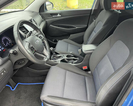 Синий Хендай Туксон, объемом двигателя 1.69 л и пробегом 179 тыс. км за 19300 $, фото 10 на Automoto.ua