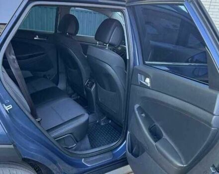 Синій Хендай Туксон, об'ємом двигуна 2 л та пробігом 90 тис. км за 19500 $, фото 4 на Automoto.ua