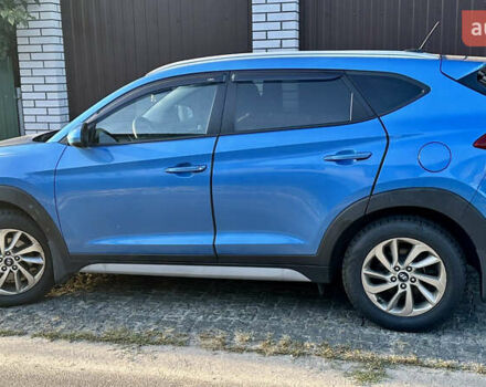 Синій Хендай Туксон, об'ємом двигуна 2 л та пробігом 60 тис. км за 17500 $, фото 3 на Automoto.ua
