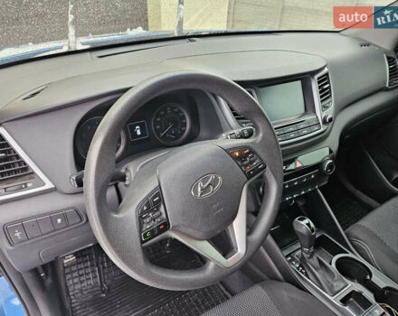 Синий Хендай Туксон, объемом двигателя 2 л и пробегом 150 тыс. км за 17999 $, фото 15 на Automoto.ua