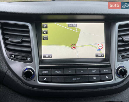 Синий Хендай Туксон, объемом двигателя 1.69 л и пробегом 179 тыс. км за 19300 $, фото 18 на Automoto.ua