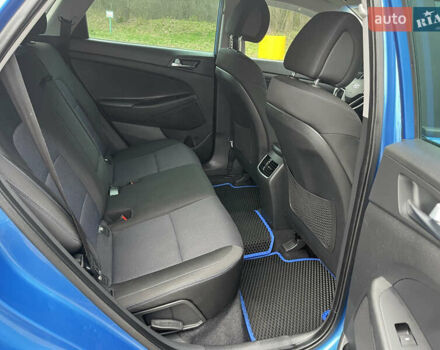 Синий Хендай Туксон, объемом двигателя 1.69 л и пробегом 179 тыс. км за 19300 $, фото 13 на Automoto.ua