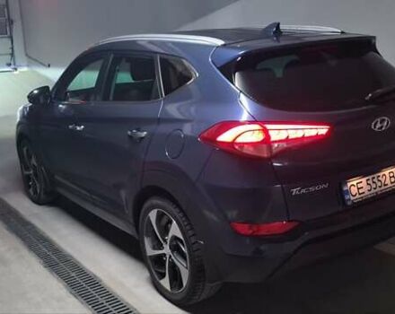 Синий Хендай Туксон, объемом двигателя 2 л и пробегом 150 тыс. км за 23500 $, фото 2 на Automoto.ua