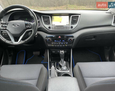 Синий Хендай Туксон, объемом двигателя 1.69 л и пробегом 179 тыс. км за 19300 $, фото 17 на Automoto.ua