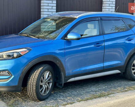 Синій Хендай Туксон, об'ємом двигуна 2 л та пробігом 60 тис. км за 17500 $, фото 5 на Automoto.ua