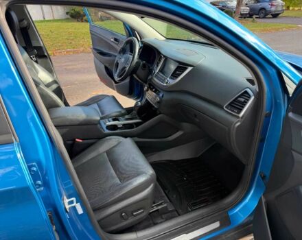 Синий Хендай Туксон, объемом двигателя 1.6 л и пробегом 53 тыс. км за 3500 $, фото 6 на Automoto.ua