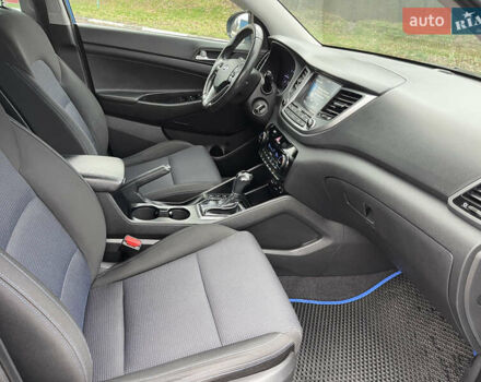 Синий Хендай Туксон, объемом двигателя 1.69 л и пробегом 179 тыс. км за 19300 $, фото 12 на Automoto.ua