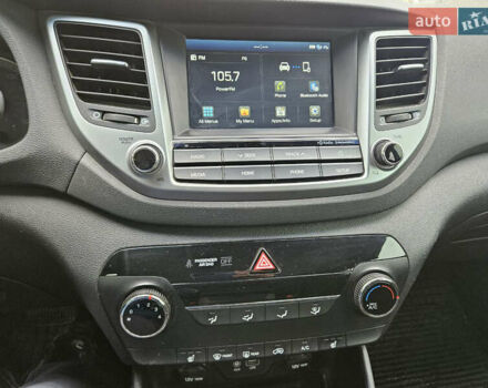 Синий Хендай Туксон, объемом двигателя 2 л и пробегом 150 тыс. км за 17999 $, фото 16 на Automoto.ua