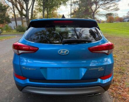 Синий Хендай Туксон, объемом двигателя 1.6 л и пробегом 53 тыс. км за 3500 $, фото 4 на Automoto.ua