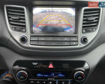 Синий Хендай Туксон, объемом двигателя 1.69 л и пробегом 179 тыс. км за 19300 $, фото 15 на Automoto.ua