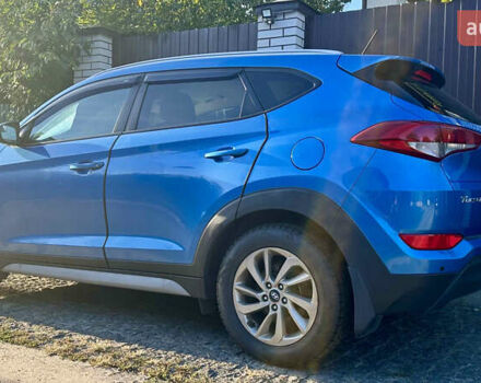 Синій Хендай Туксон, об'ємом двигуна 2 л та пробігом 60 тис. км за 17500 $, фото 27 на Automoto.ua