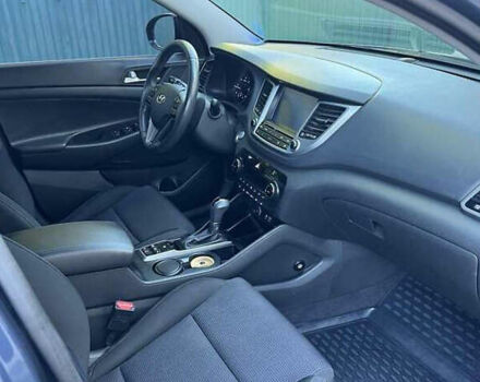 Синій Хендай Туксон, об'ємом двигуна 2 л та пробігом 90 тис. км за 21500 $, фото 3 на Automoto.ua