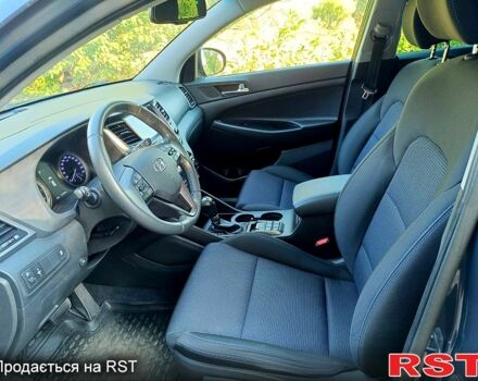 Синій Хендай Туксон, об'ємом двигуна 2 л та пробігом 162 тис. км за 18000 $, фото 3 на Automoto.ua