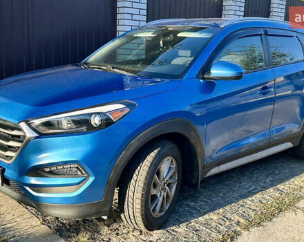 Синій Хендай Туксон, об'ємом двигуна 2 л та пробігом 60 тис. км за 17500 $, фото 26 на Automoto.ua