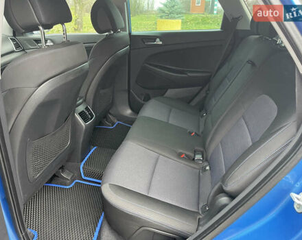 Синий Хендай Туксон, объемом двигателя 1.69 л и пробегом 179 тыс. км за 19300 $, фото 14 на Automoto.ua