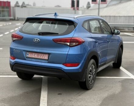 Синий Хендай Туксон, объемом двигателя 2 л и пробегом 58 тыс. км за 17200 $, фото 3 на Automoto.ua
