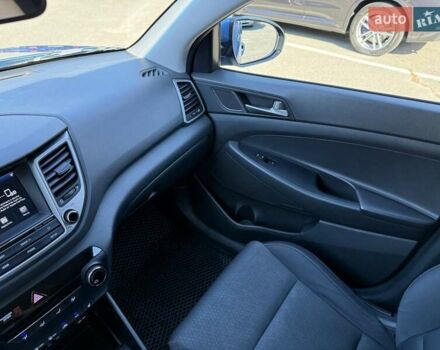 Синий Хендай Туксон, объемом двигателя 2 л и пробегом 108 тыс. км за 16300 $, фото 23 на Automoto.ua