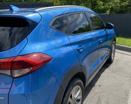 Синій Хендай Туксон, об'ємом двигуна 2 л та пробігом 121 тис. км за 17600 $, фото 4 на Automoto.ua