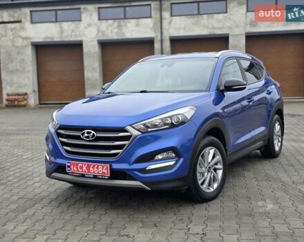 Синий Хендай Туксон, объемом двигателя 1.6 л и пробегом 176 тыс. км за 17800 $, фото 3 на Automoto.ua