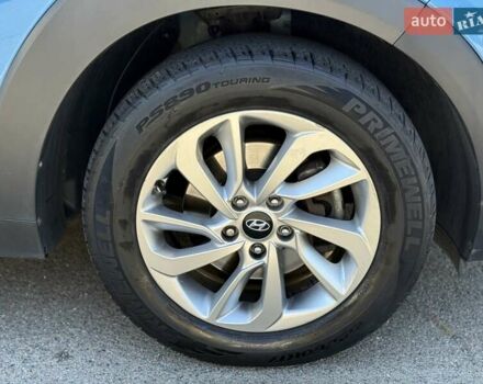 Синий Хендай Туксон, объемом двигателя 2 л и пробегом 108 тыс. км за 16300 $, фото 9 на Automoto.ua