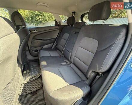 Синий Хендай Туксон, объемом двигателя 2 л и пробегом 108 тыс. км за 16300 $, фото 30 на Automoto.ua