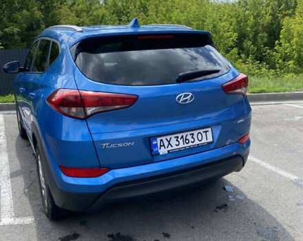 Синій Хендай Туксон, об'ємом двигуна 2 л та пробігом 121 тис. км за 17600 $, фото 5 на Automoto.ua