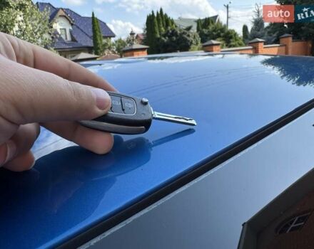 Синій Хендай Туксон, об'ємом двигуна 2 л та пробігом 92 тис. км за 17300 $, фото 24 на Automoto.ua