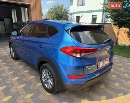 Синій Хендай Туксон, об'ємом двигуна 2 л та пробігом 92 тис. км за 17300 $, фото 4 на Automoto.ua