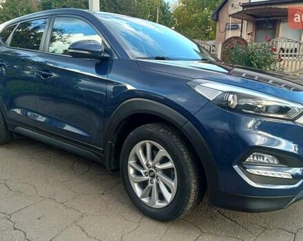 Синий Хендай Туксон, объемом двигателя 2 л и пробегом 83 тыс. км за 17700 $, фото 8 на Automoto.ua