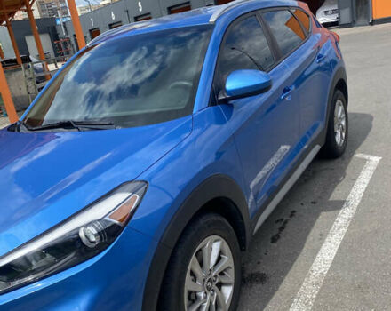 Синій Хендай Туксон, об'ємом двигуна 2 л та пробігом 121 тис. км за 17600 $, фото 1 на Automoto.ua