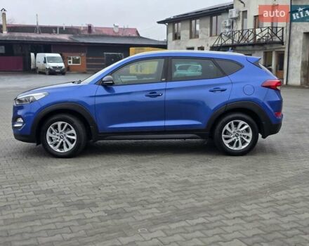 Синий Хендай Туксон, объемом двигателя 1.6 л и пробегом 176 тыс. км за 17800 $, фото 12 на Automoto.ua